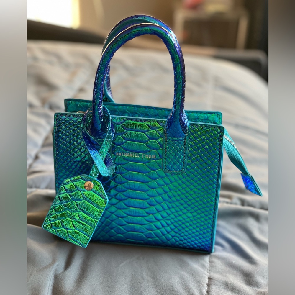 Noir-X, Python mini purse. Blue chrome reflective color way. Silver hardware.